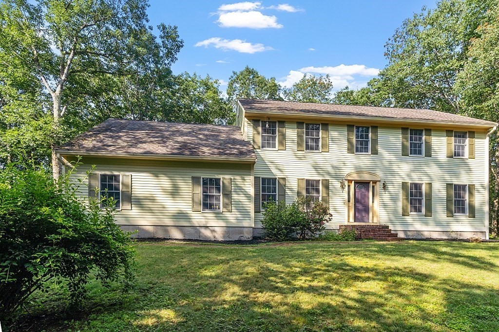 323 Knower Road Westminster, MA 01473 - Photo 2 of 42 a front view of a house with garden