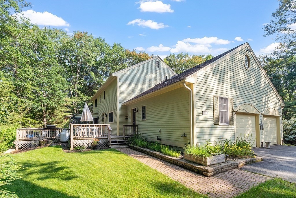 323 Knower Road Westminster, MA 01473 - Photo 4 of 42 a view of a house with backyard porch and sitting area