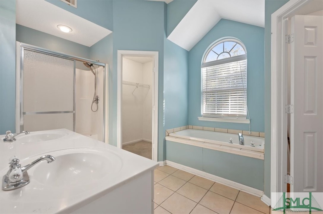 305 Elm Road Ellabell, GA 31308 - Photo 18 of 44 The primary bath features a private water closet.