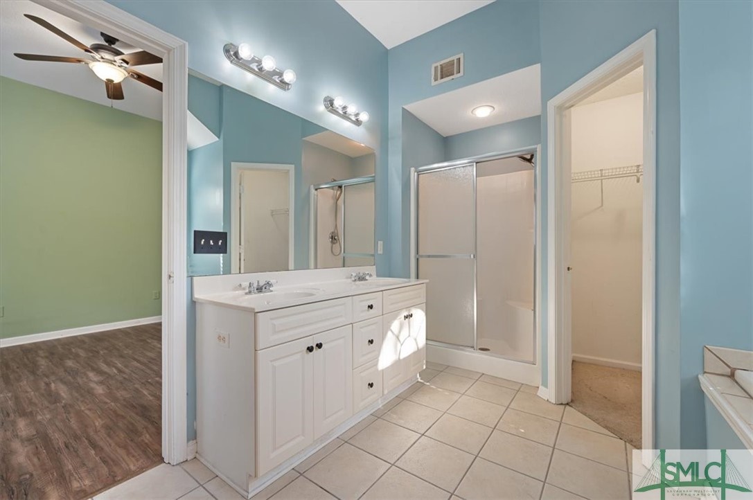 305 Elm Road Ellabell, GA 31308 - Photo 22 of 44 There are also two walk-in closets.