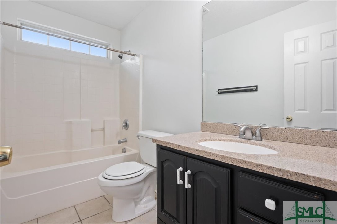 305 Elm Road Ellabell, GA 31308 - Photo 26 of 44 Second full bath with a shower over tub.