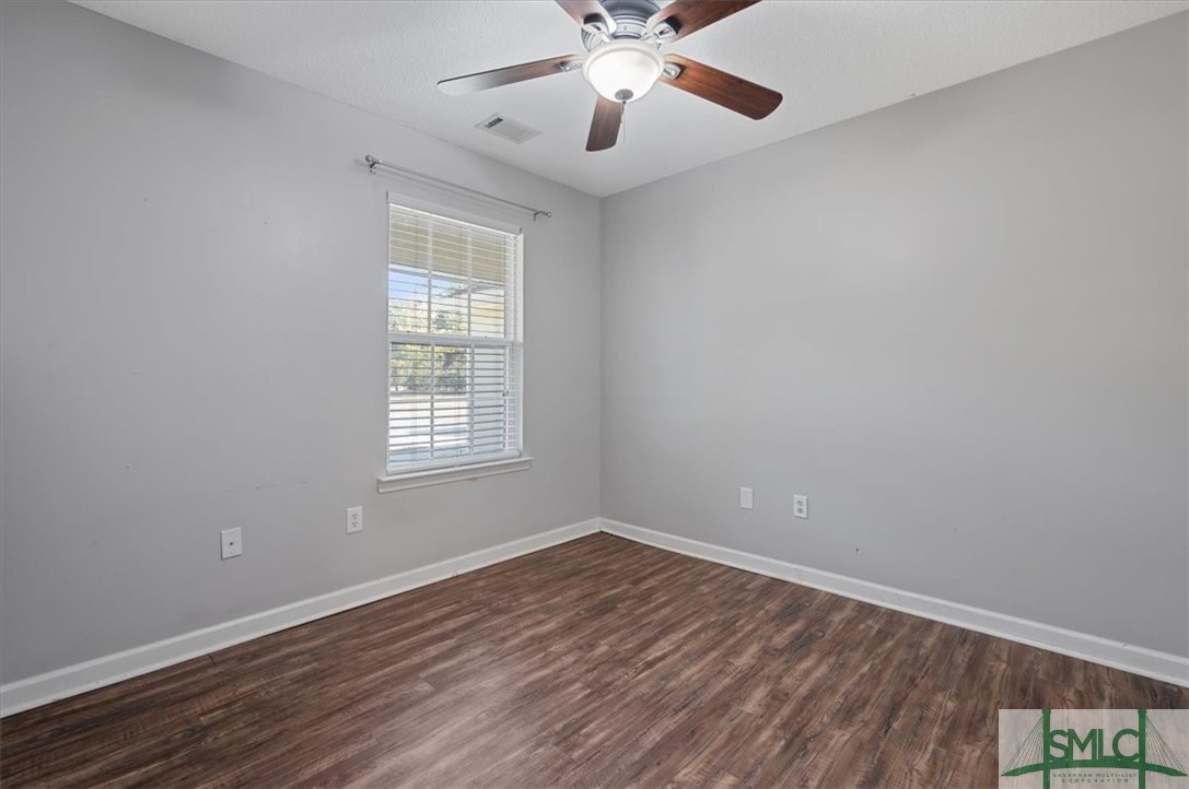 305 Elm Road Ellabell, GA 31308 - Photo 27 of 44 Third bedroom with lighted fan.