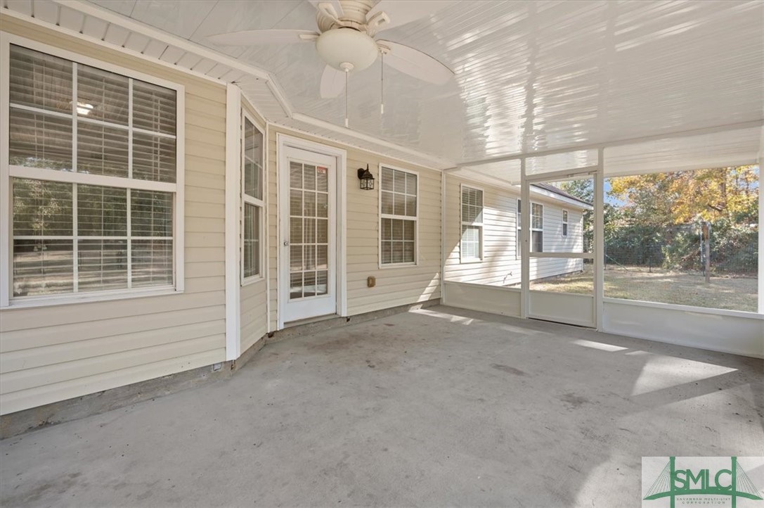 305 Elm Road Ellabell, GA 31308 - Photo 30 of 44 Screened back porch with ceiling fan.