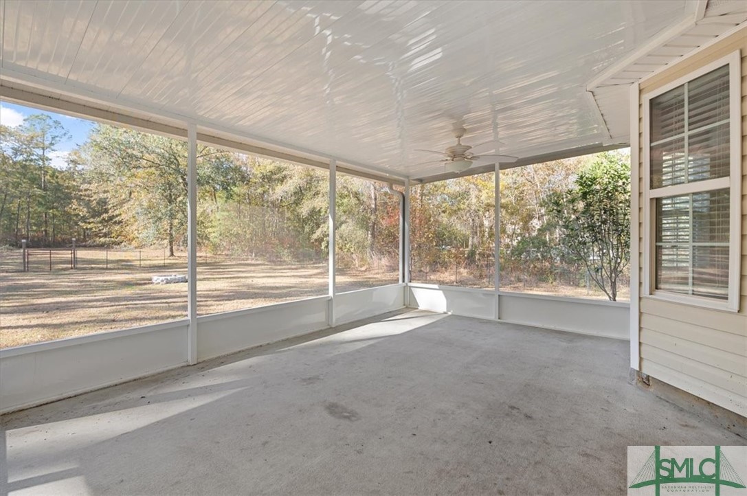 305 Elm Road Ellabell, GA 31308 - Photo 31 of 44 The screened porch offers backyard views.