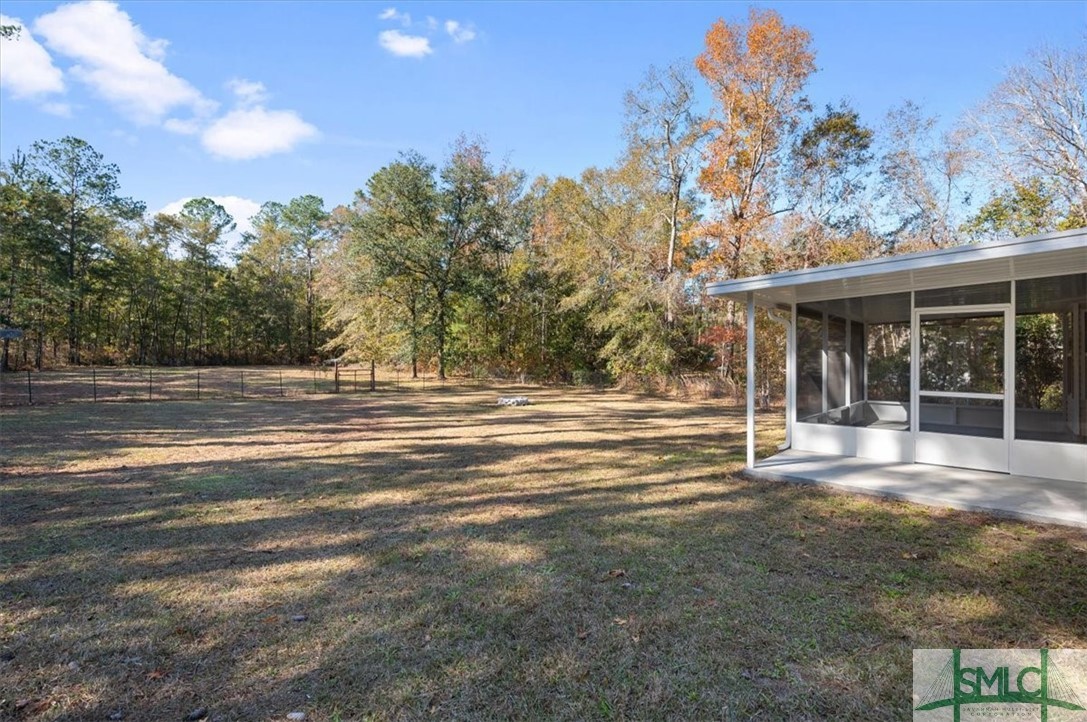 305 Elm Road Ellabell, GA 31308 - Photo 34 of 44 Huge backyard space.