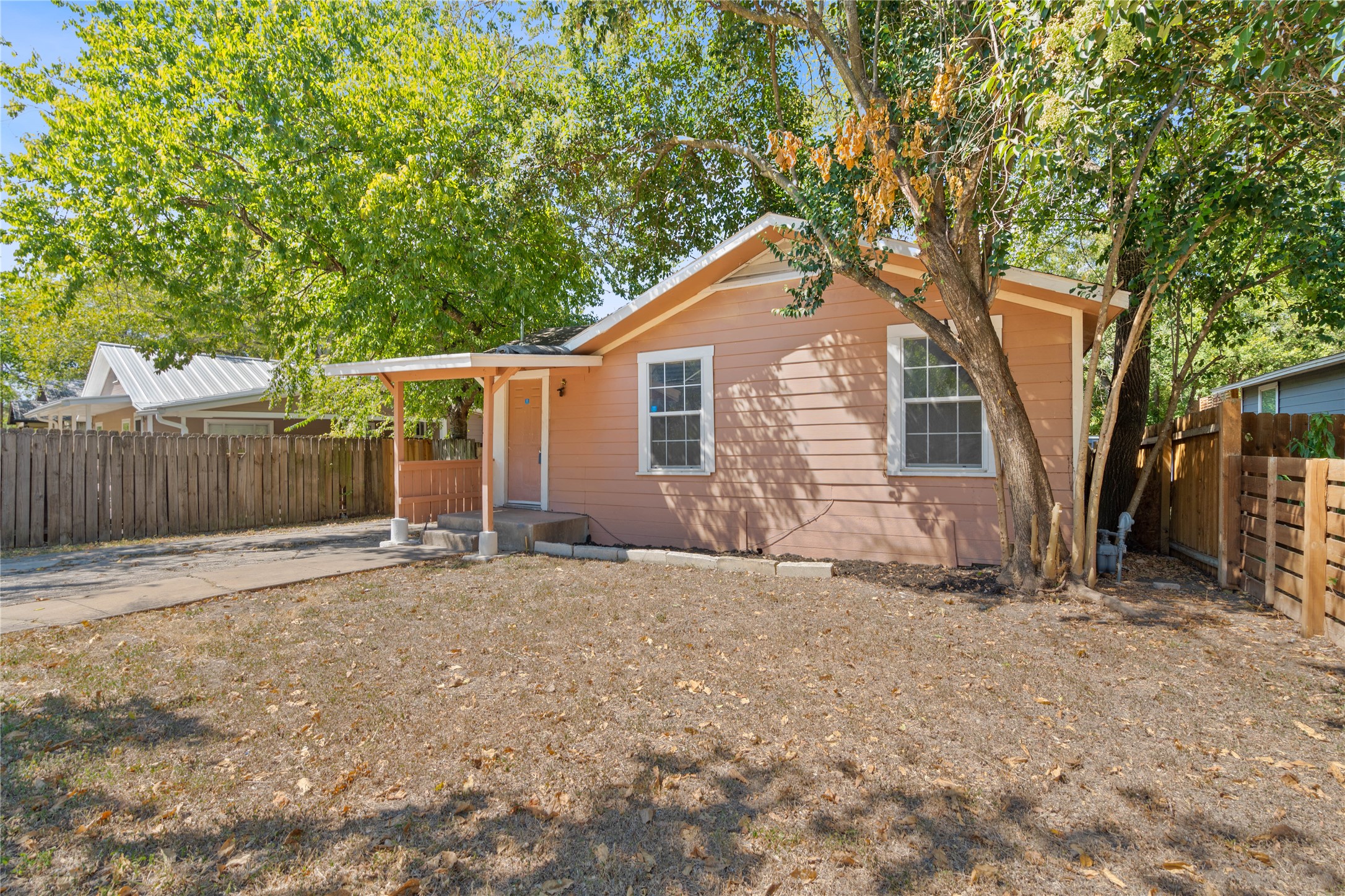 1114 Eleanor Street Austin, TX 78721 - Photo 5 of 5 a backyard of a house