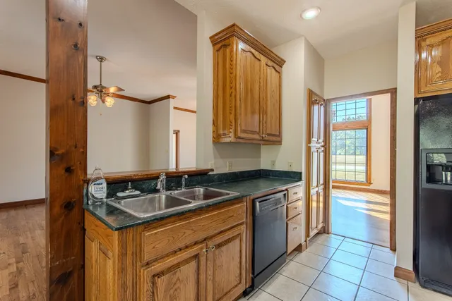 a kitchen that has a sink and a stove