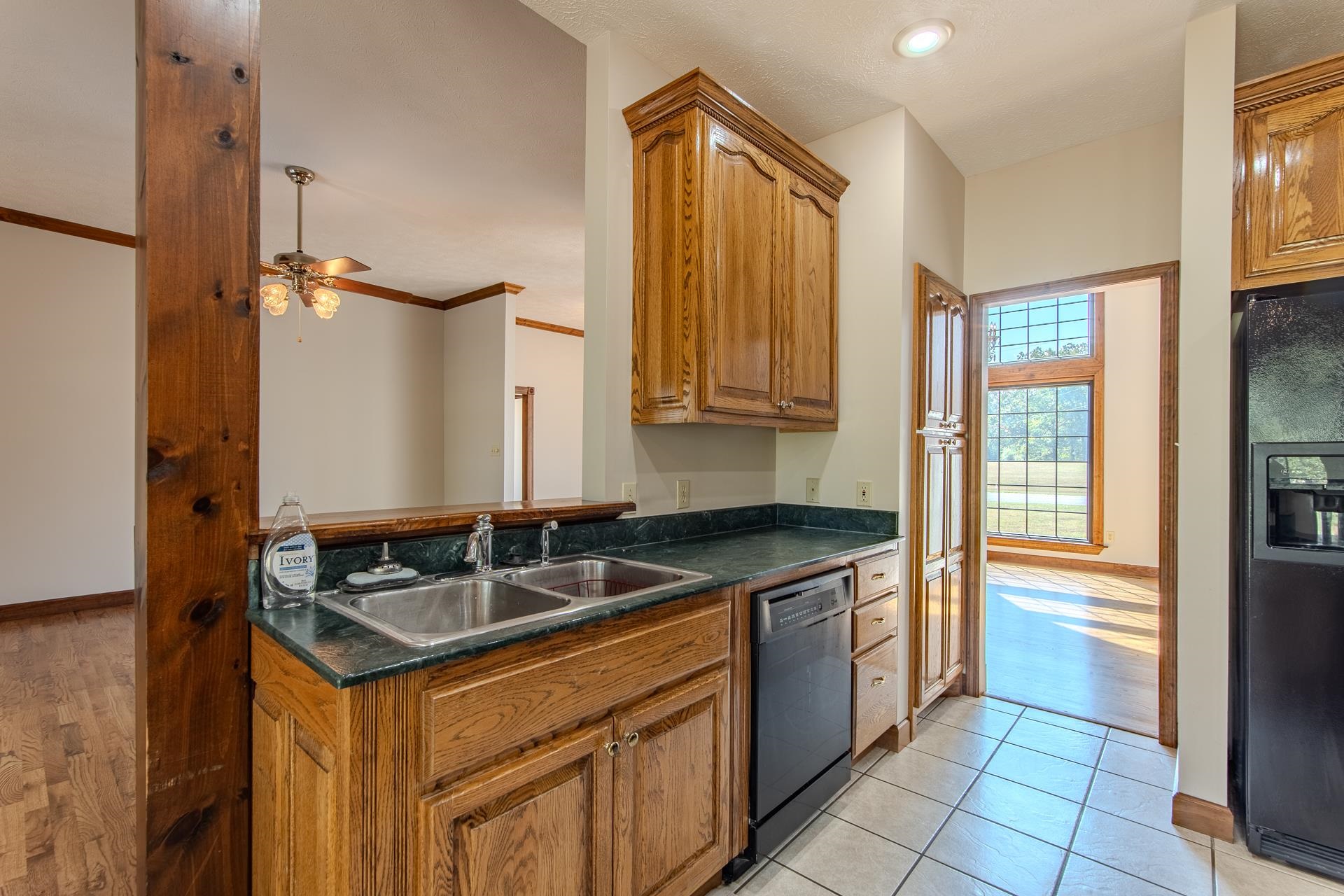 200 Grandview Circle Adamsville, TN 38310 - Photo 12 of 40 a kitchen that has a sink and a stove