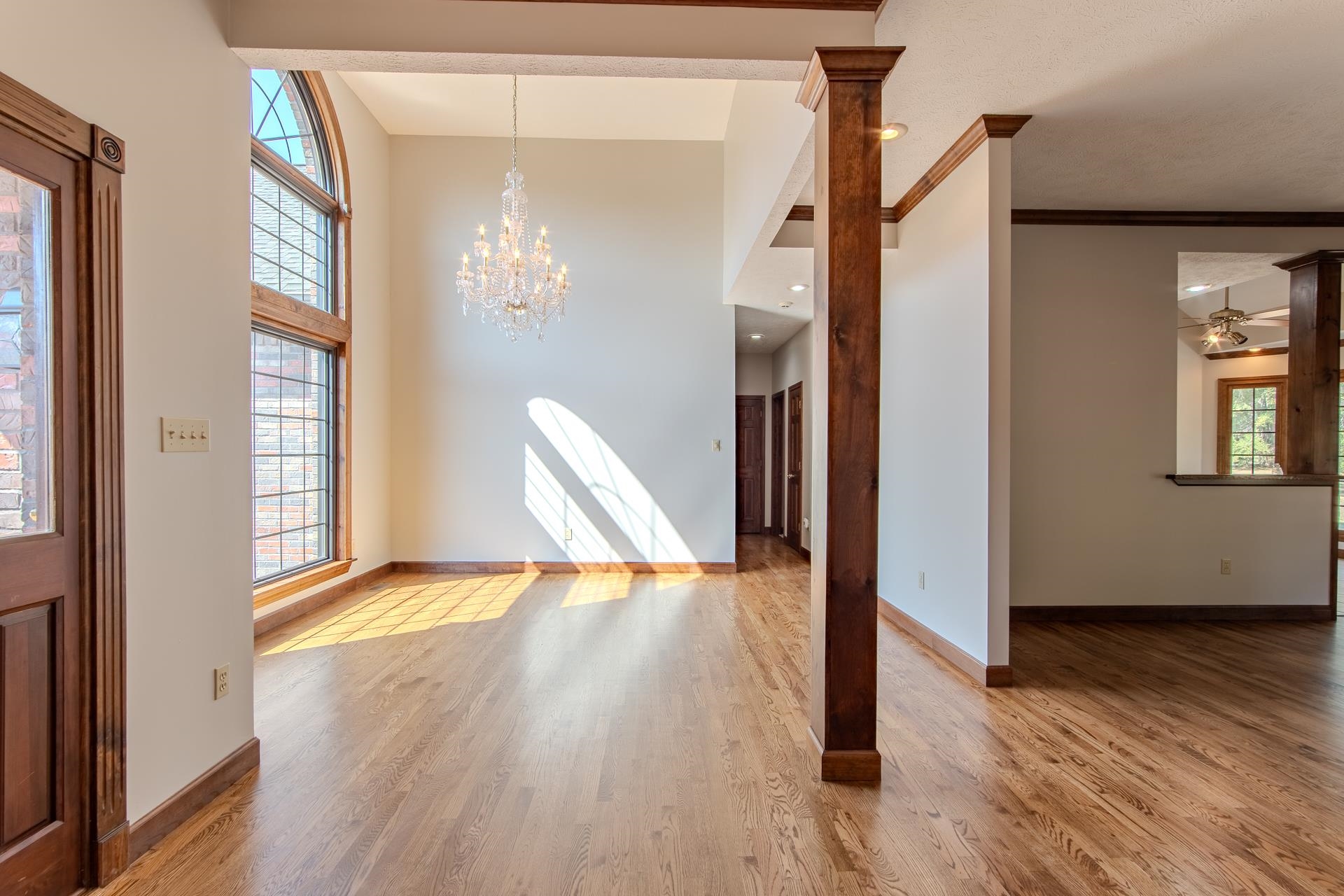 200 Grandview Circle Adamsville, TN 38310 - Photo 19 of 40 a view of an empty room with wooden floor and a window
