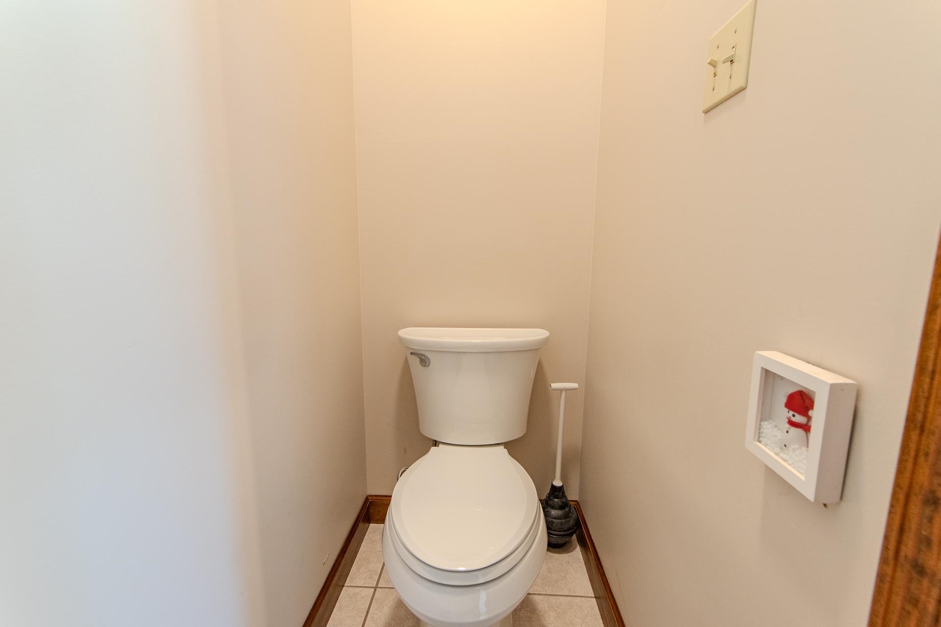 200 Grandview Circle Adamsville, TN 38310 - Photo 20 of 40 a white toilet sitting next to a white wall