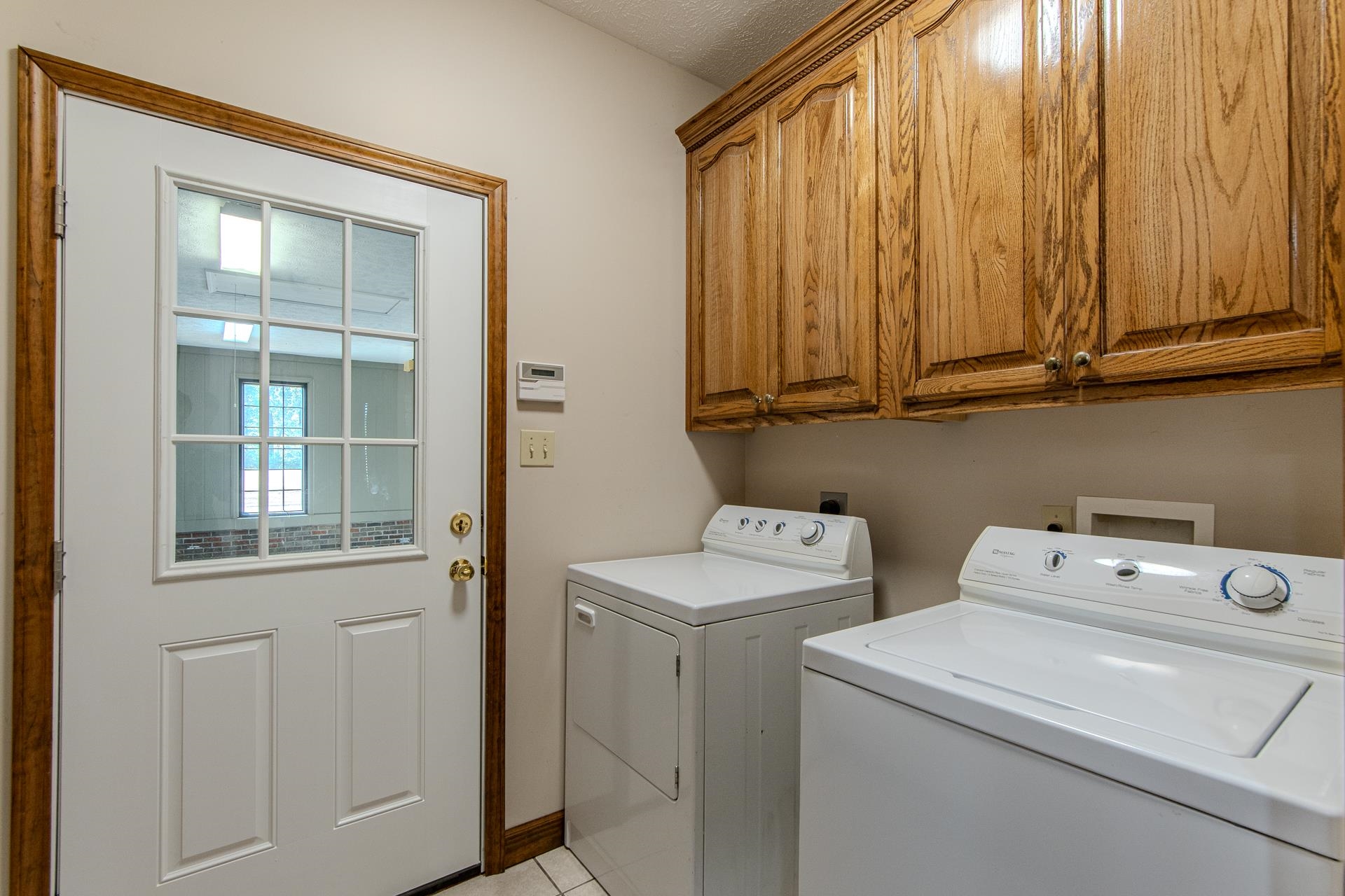 200 Grandview Circle Adamsville, TN 38310 - Photo 28 of 40 a utility room with dryer and washer