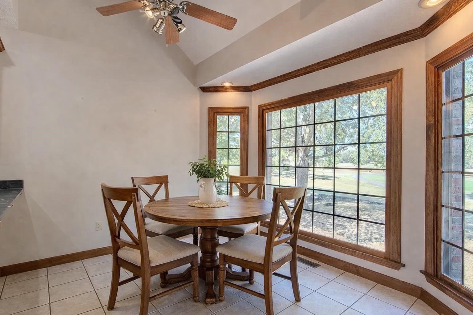 200 Grandview Circle Adamsville, TN 38310 - Photo 28 of 40 a view of a dining room with furniture window and wooden floor