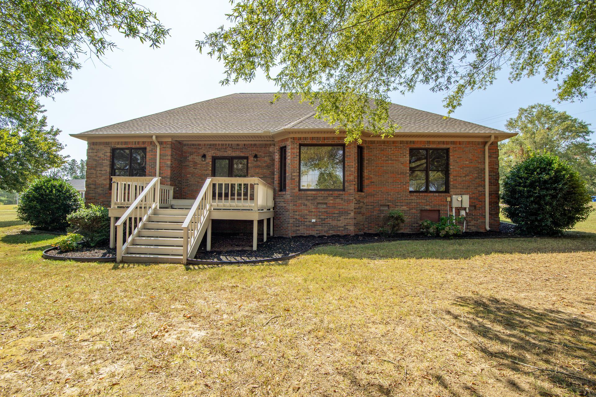 200 Grandview Circle Adamsville, TN 38310 - Photo 31 of 40 a front view of a house with a yard