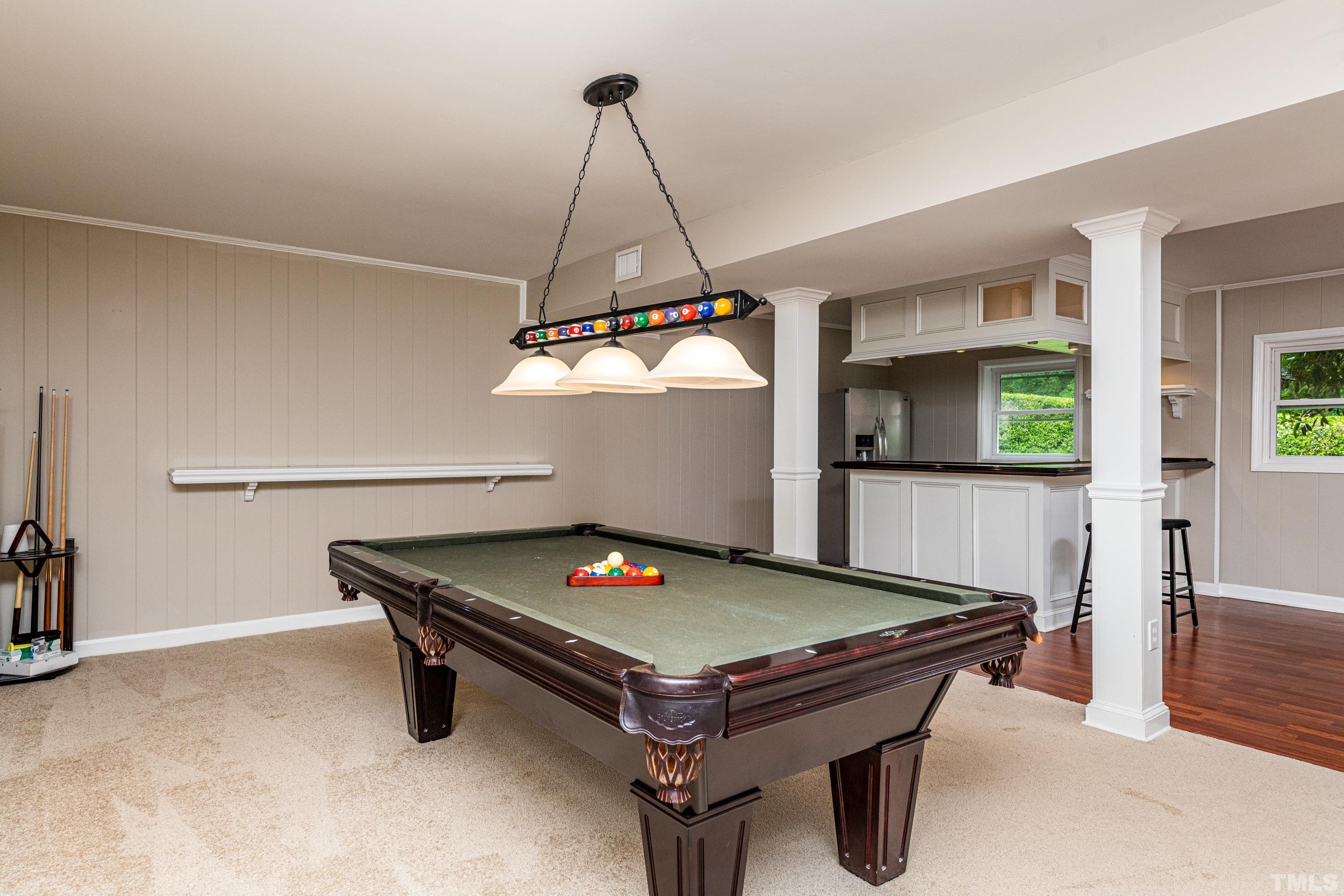 201 Chatterson Drive Raleigh, NC 27615 - Photo 28 of 44 a room with pool table and windows