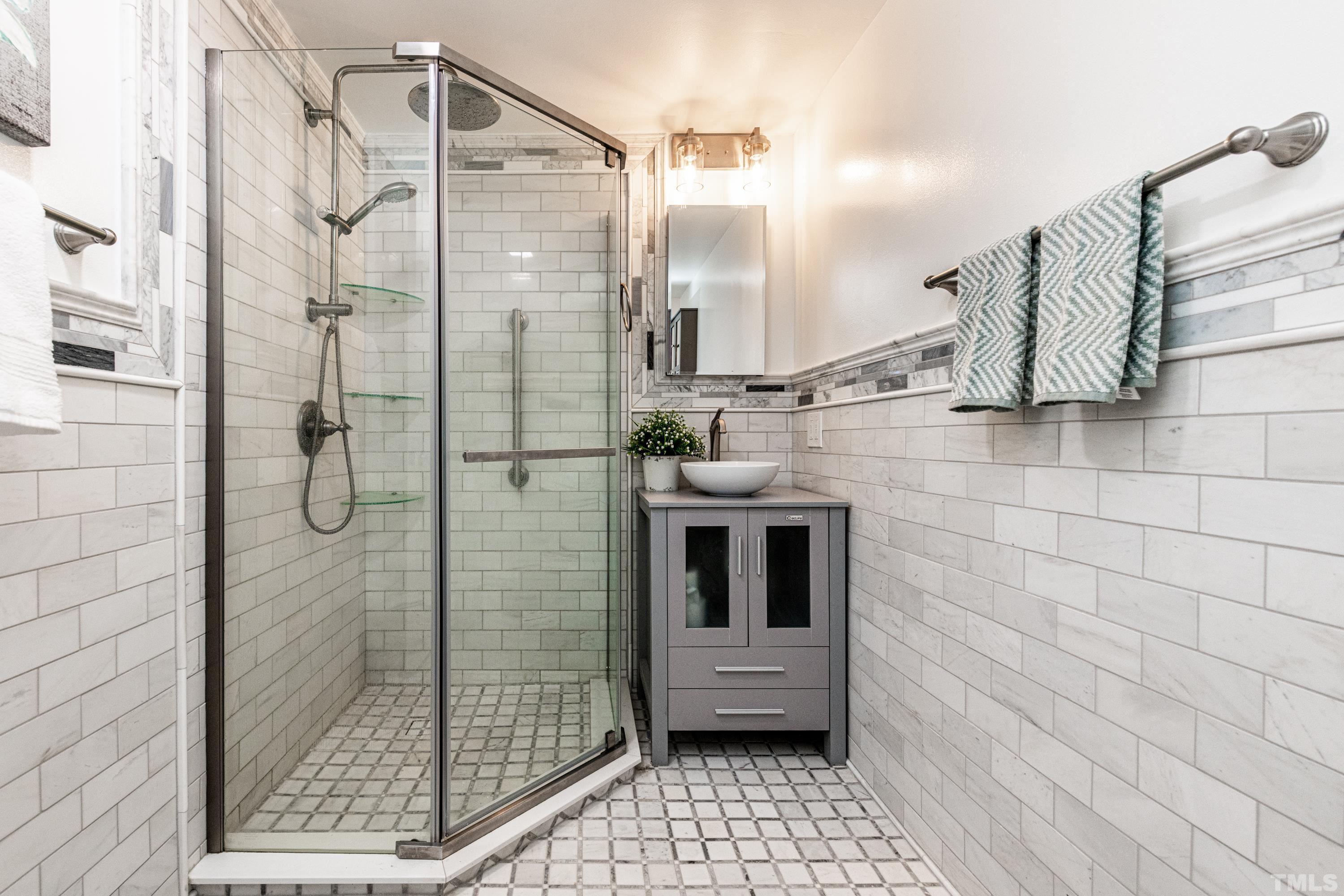 201 Chatterson Drive Raleigh, NC 27615 - Photo 33 of 44 a bathroom with a shower