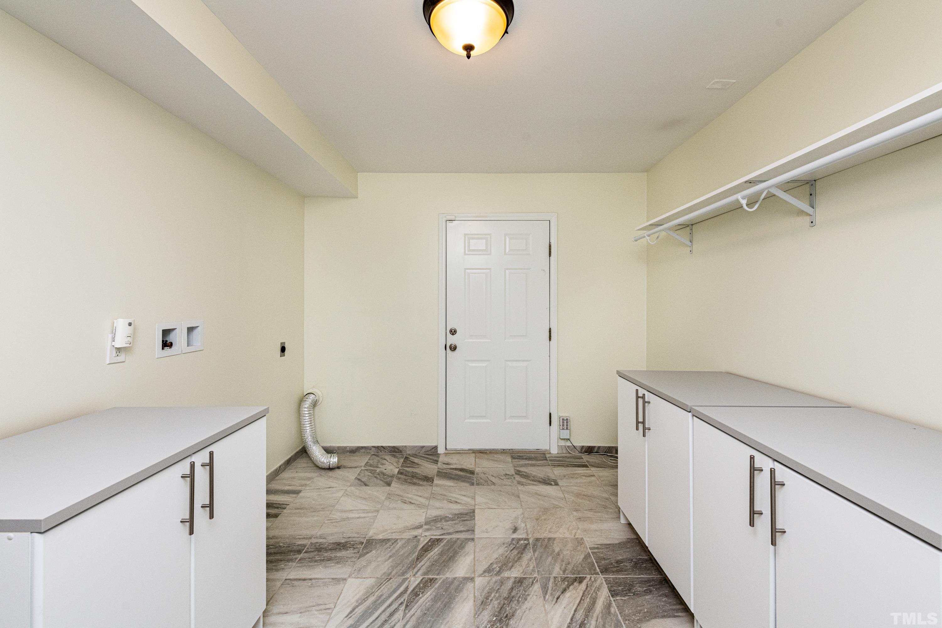 201 Chatterson Drive Raleigh, NC 27615 - Photo 35 of 44 a bathroom with a sink and a mirror
