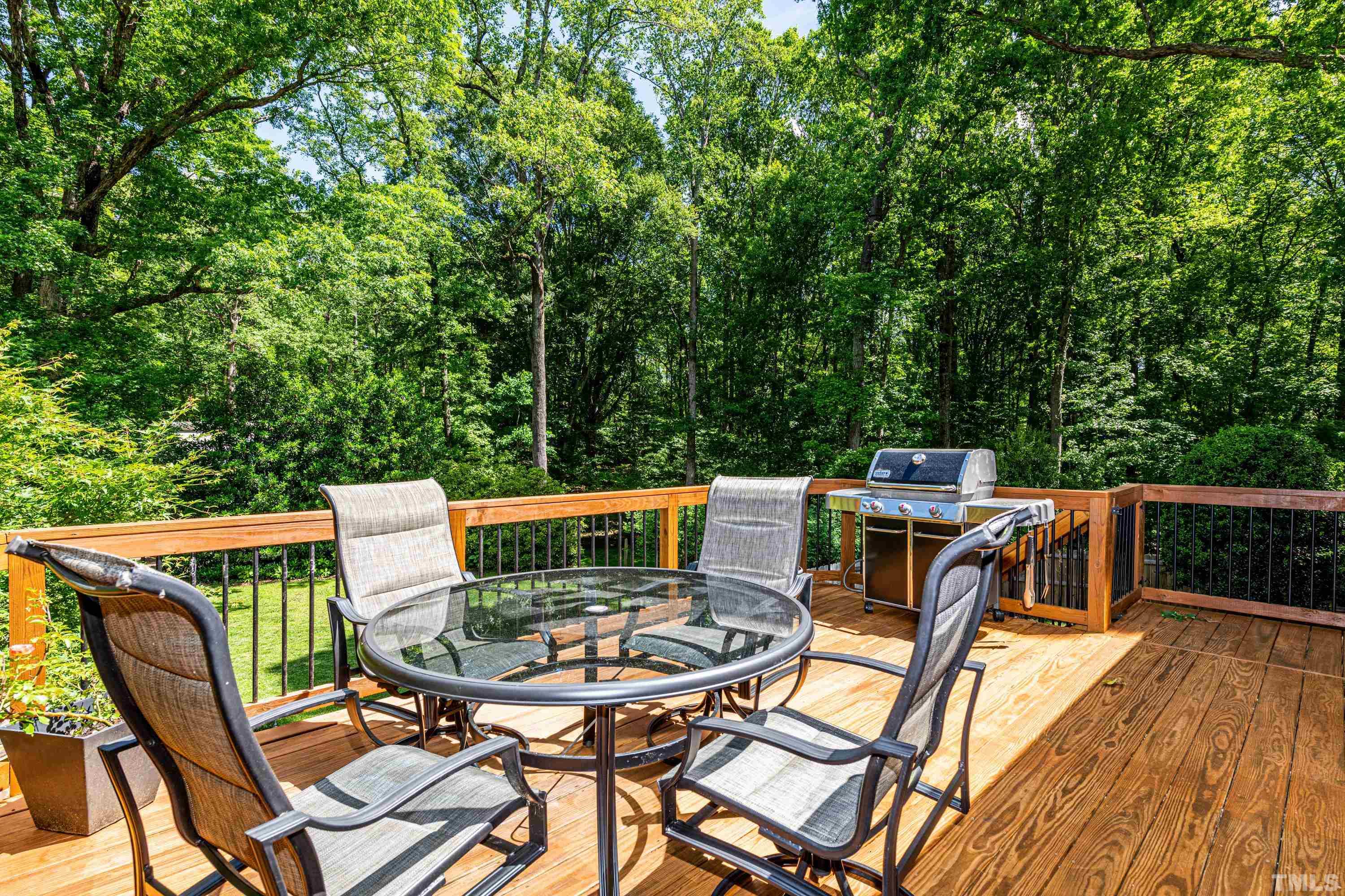 201 Chatterson Drive Raleigh, NC 27615 - Photo 36 of 44 a view of a chairs and table in the roof deck