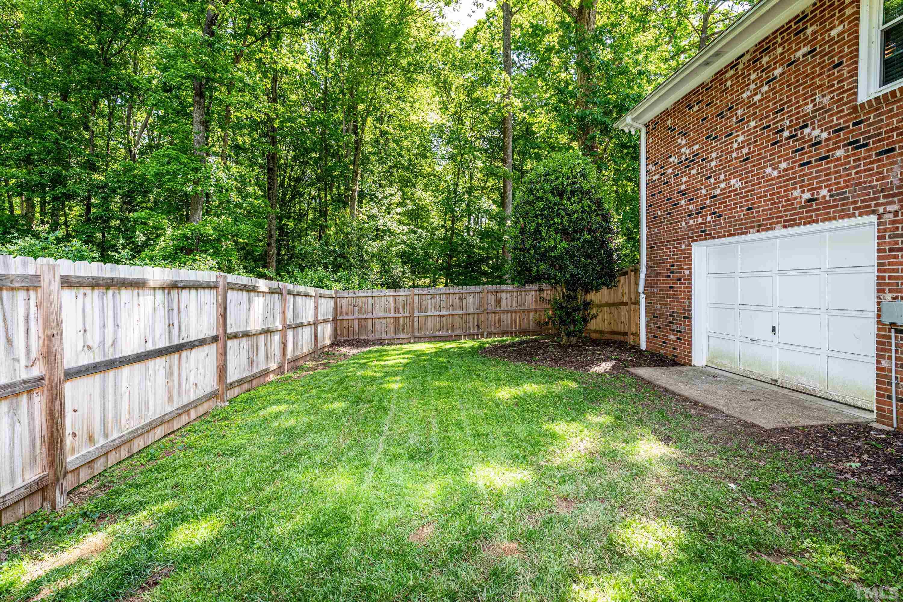 201 Chatterson Drive Raleigh, NC 27615 - Photo 42 of 44 a view of backyard with green space