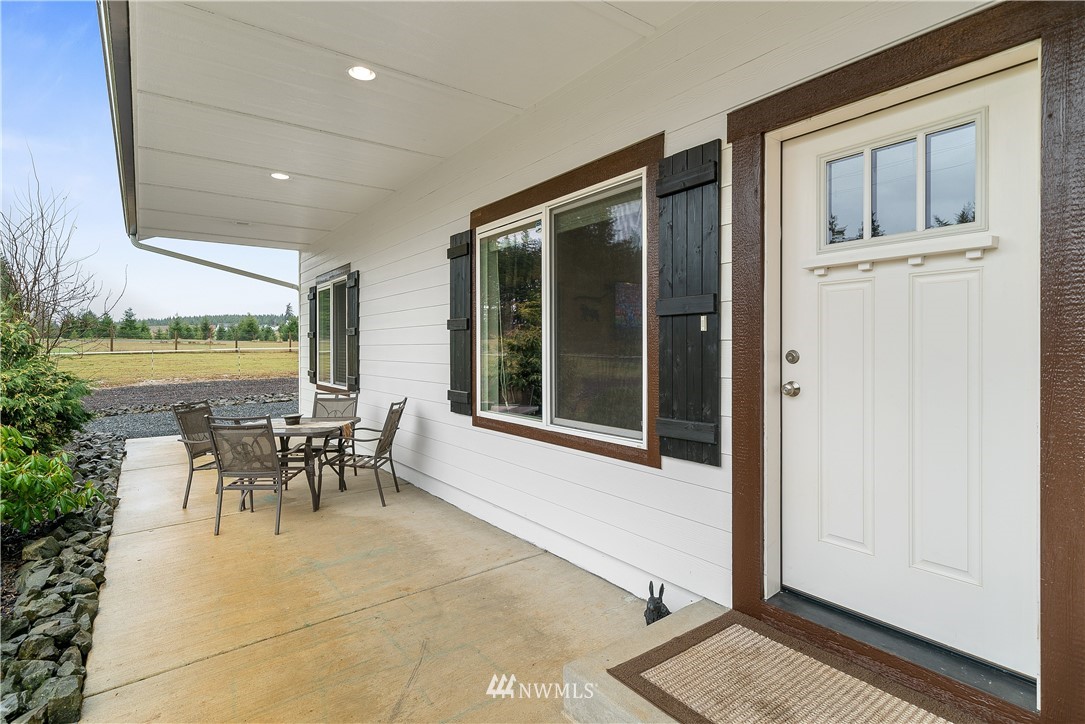 316 Pleasant Hill Road Chehalis, WA 98532 - Photo 5 of 30 a dining room with furniture and a floor to ceiling window