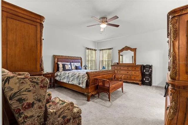 a bedroom with a bed and furniture