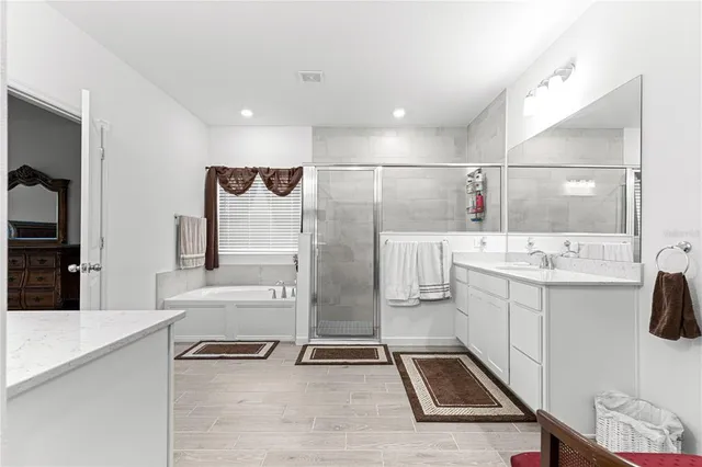 a room with furniture and wooden floor