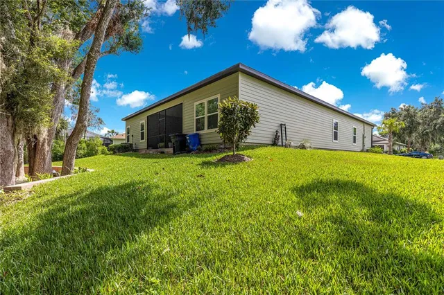 a front view of a house with yard