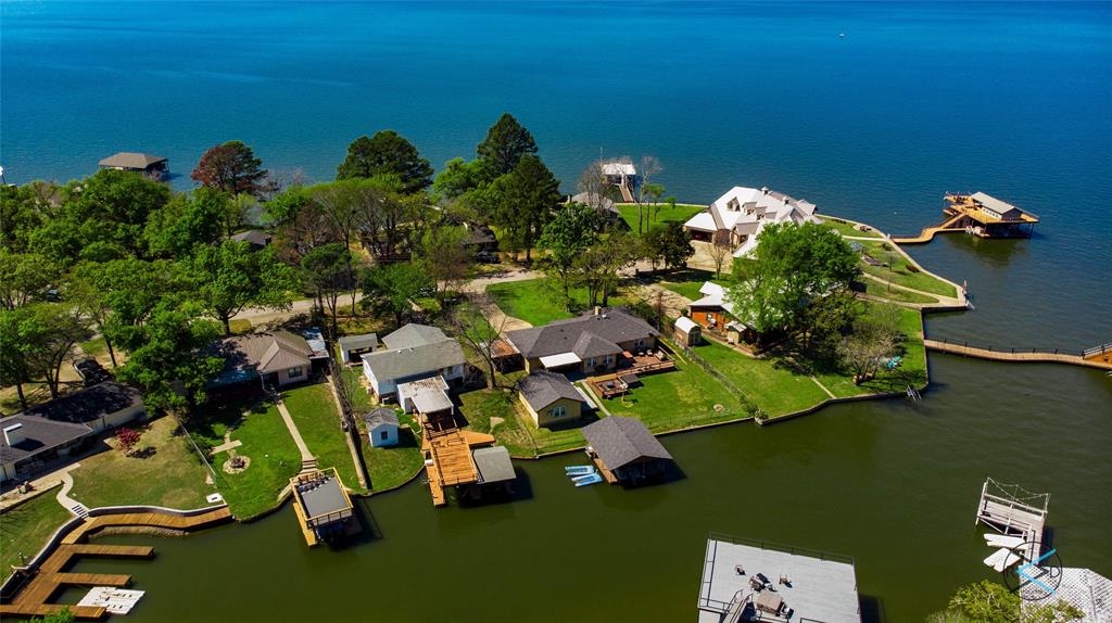 126 Maples Trail Mabank, TX 75156 - Photo 1 of 21 an aerial view of a house with yard swimming pool and outdoor seating