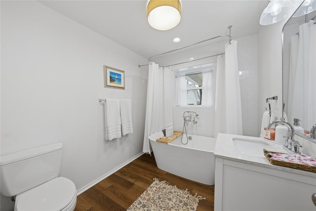 126 Maples Trail Mabank, TX 75156 - Photo 12 of 23 a bathroom with a sink and a mirror