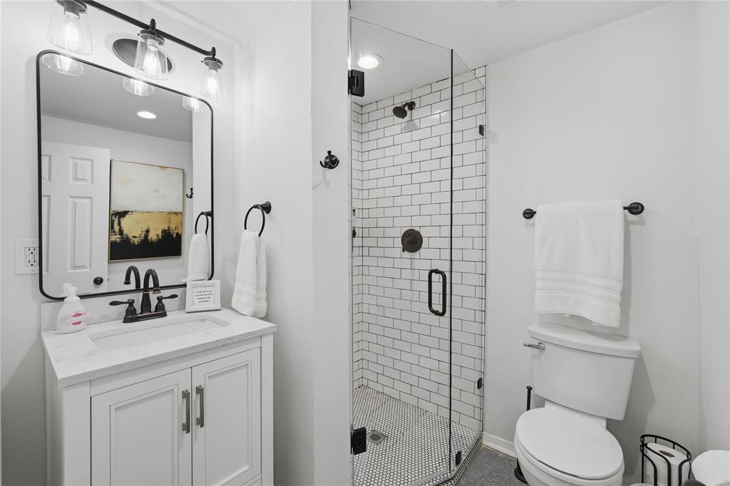 126 Maples Trail Mabank, TX 75156 - Photo 16 of 21 a bathroom with a sink a toilet and shower