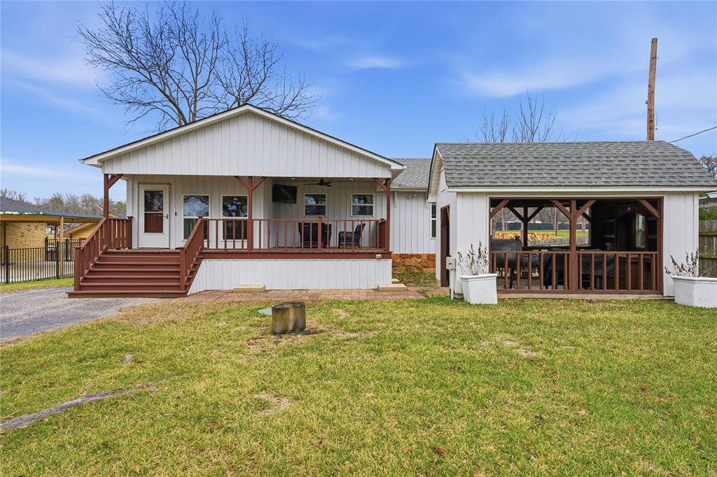 126 Maples Trail Mabank, TX 75156 - Photo 2 of 21 a view of a house with pool and a yard