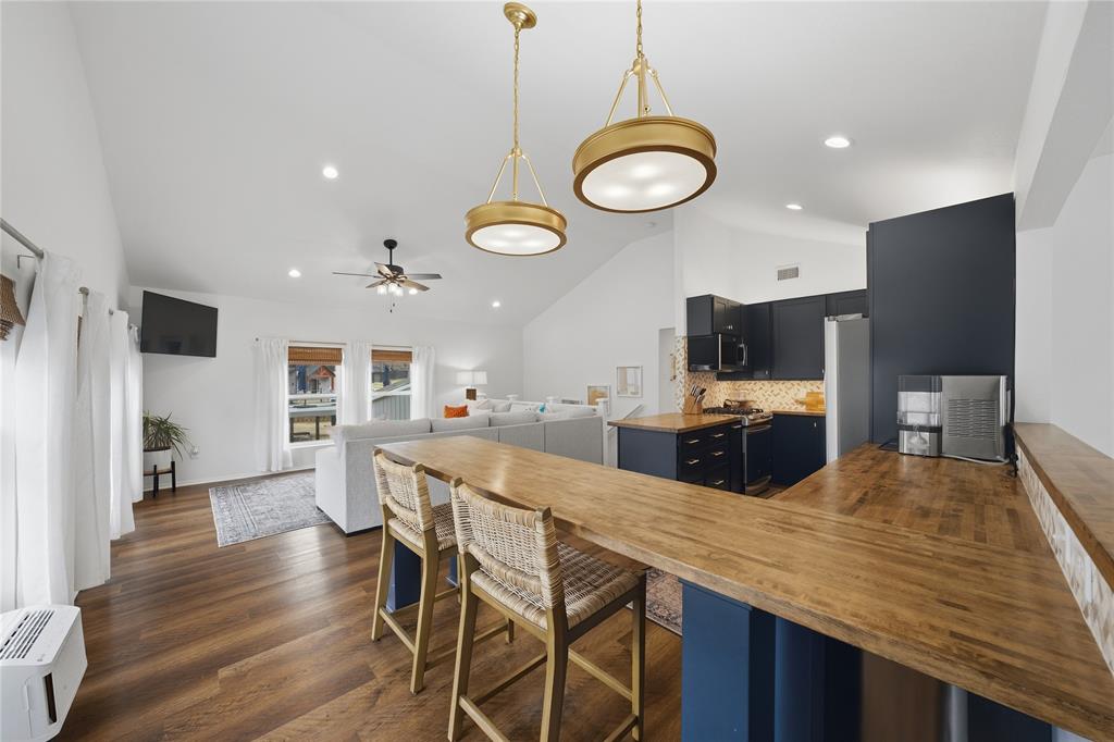 126 Maples Trail Mabank, TX 75156 - Photo 7 of 21 a large kitchen with a table and chairs