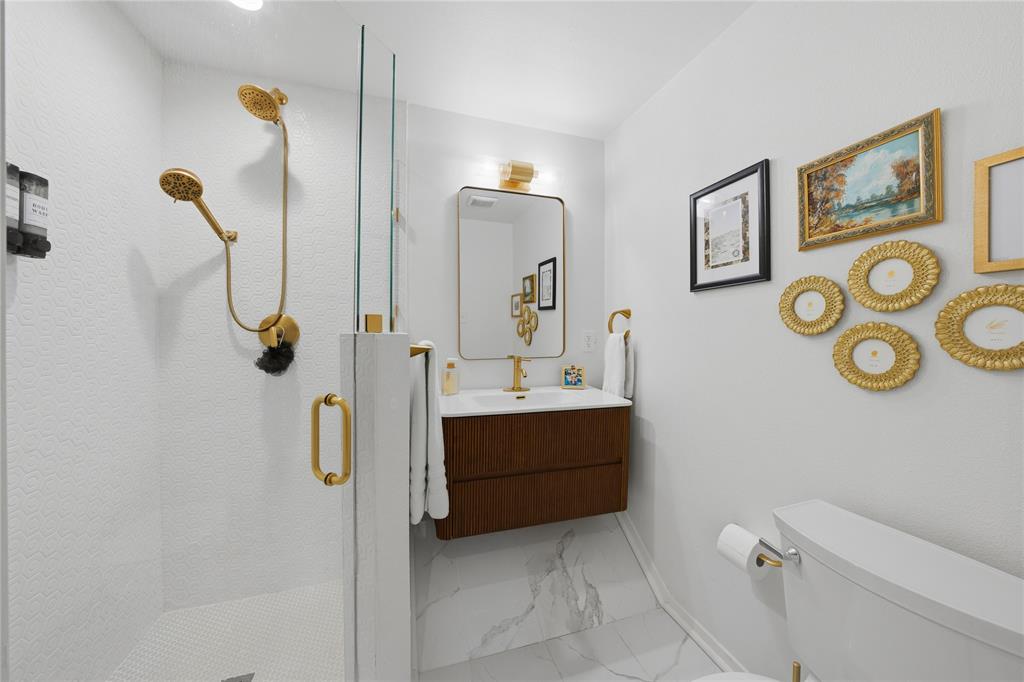 126 Maples Trail Mabank, TX 75156 - Photo 10 of 21 a bathroom with a shower and mirror