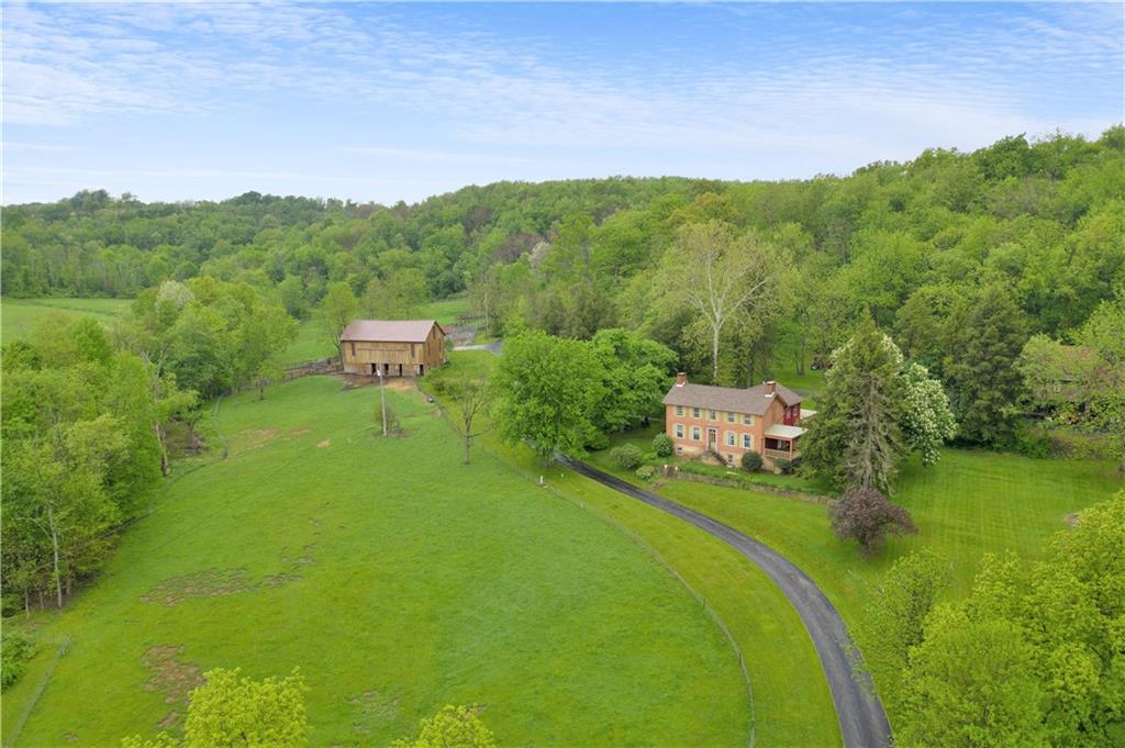 2560 Chapel Road Beaver, PA 15009 - Photo 2 of 25 a view of a lake with a mountain in the background