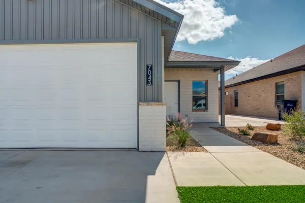 a view of a entryway door front of house