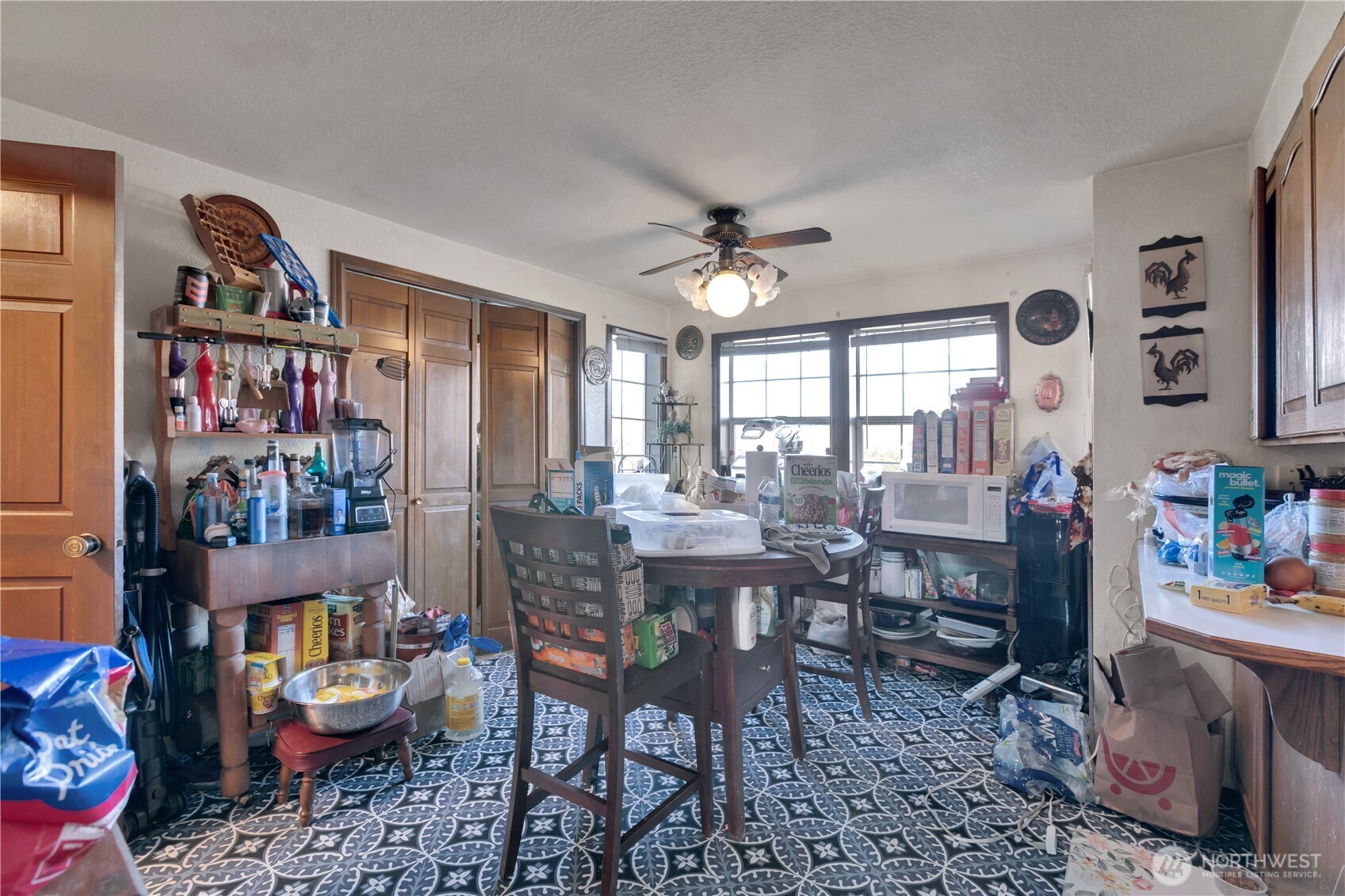 26836 Southeast 208th Street Maple Valley, WA 98038 - Photo 20 of 37 a view of a dining room with furniture and a window