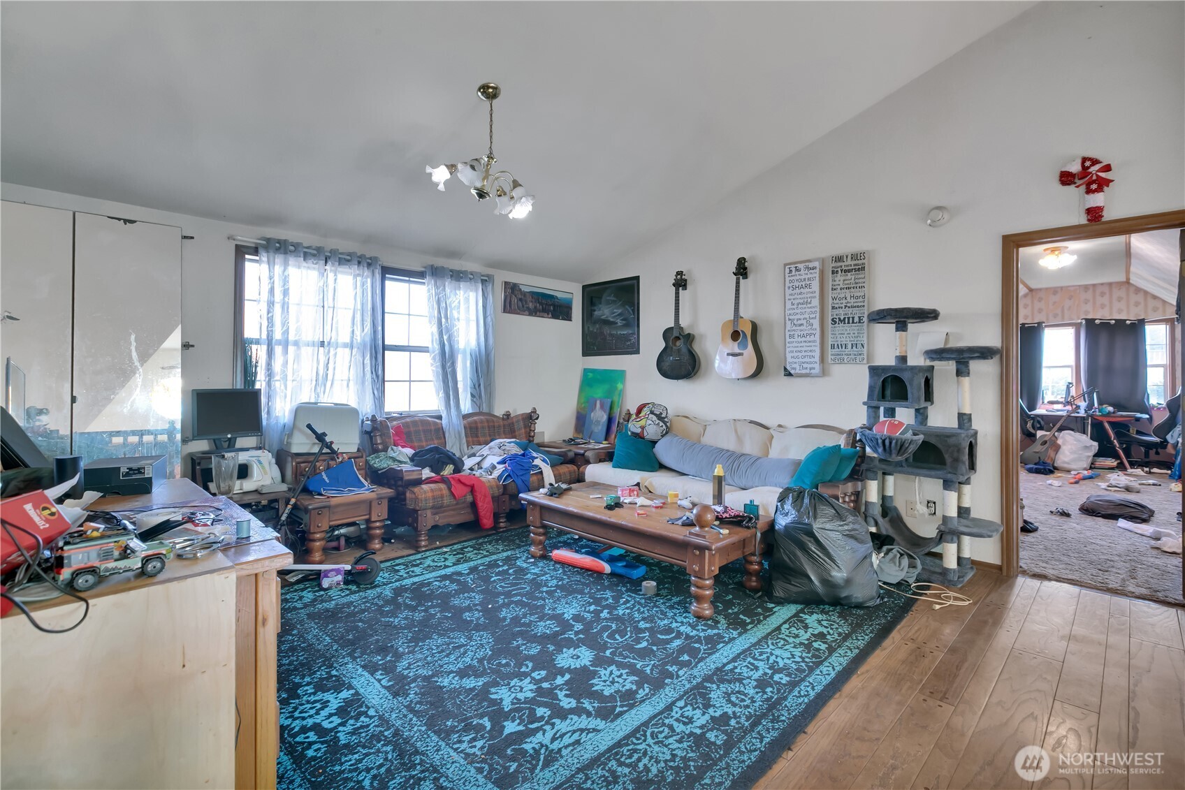 26836 Southeast 208th Street Maple Valley, WA 98038 - Photo 27 of 37 a living room with furniture and a large window