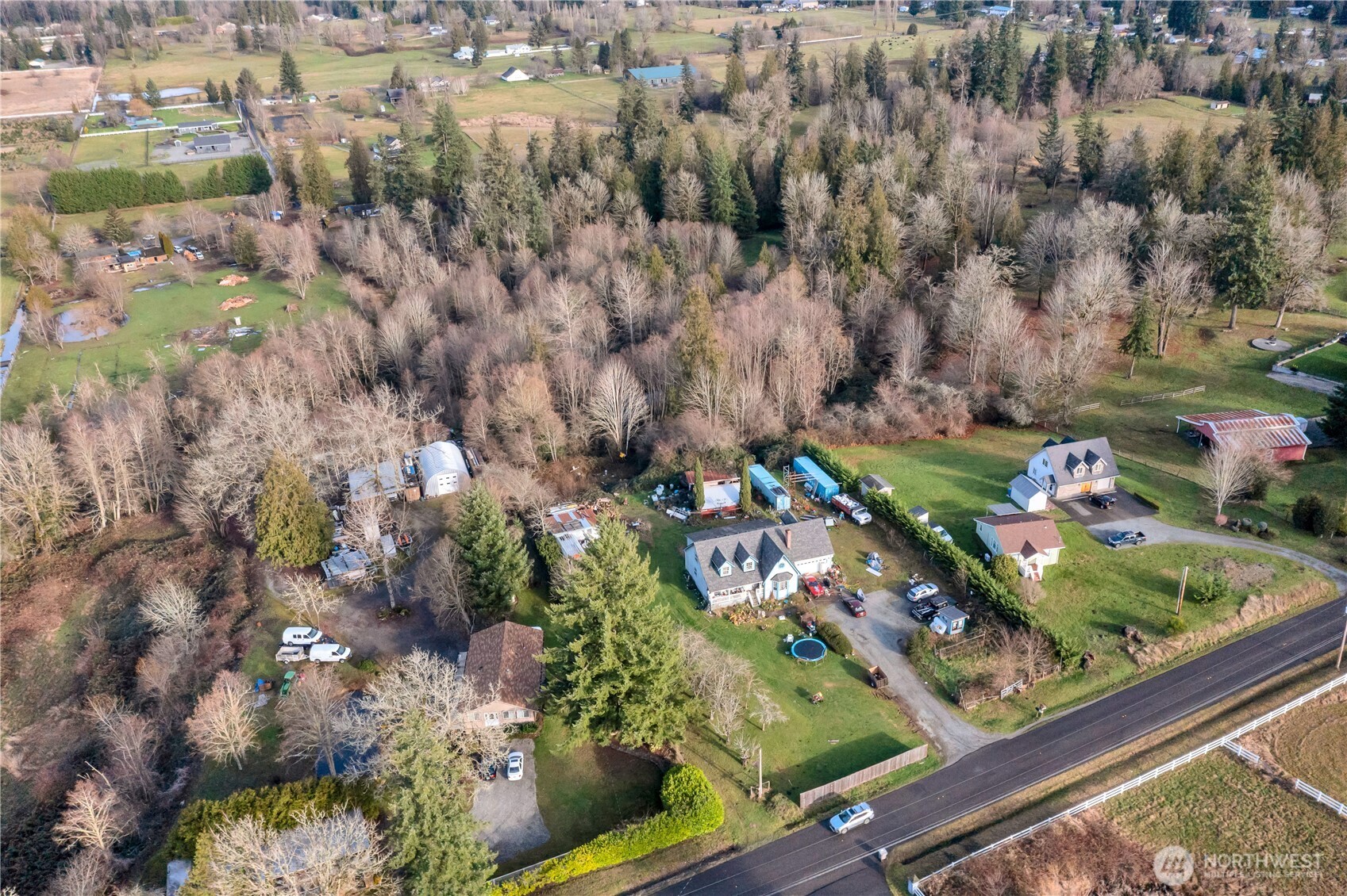 26836 Southeast 208th Street Maple Valley, WA 98038 - Photo 4 of 37 an aerial view of residential houses with outdoor space