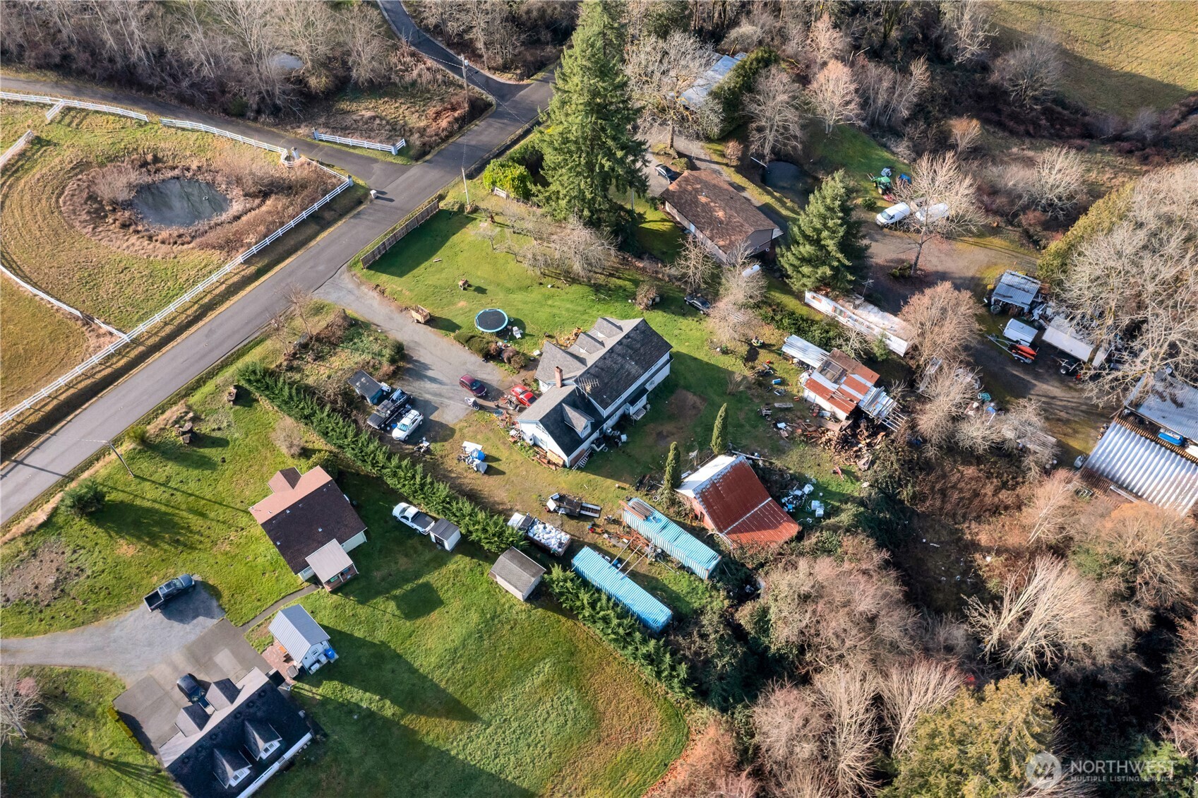 26836 Southeast 208th Street Maple Valley, WA 98038 - Photo 8 of 37 an aerial view of residential house with outdoor space and swimming pool