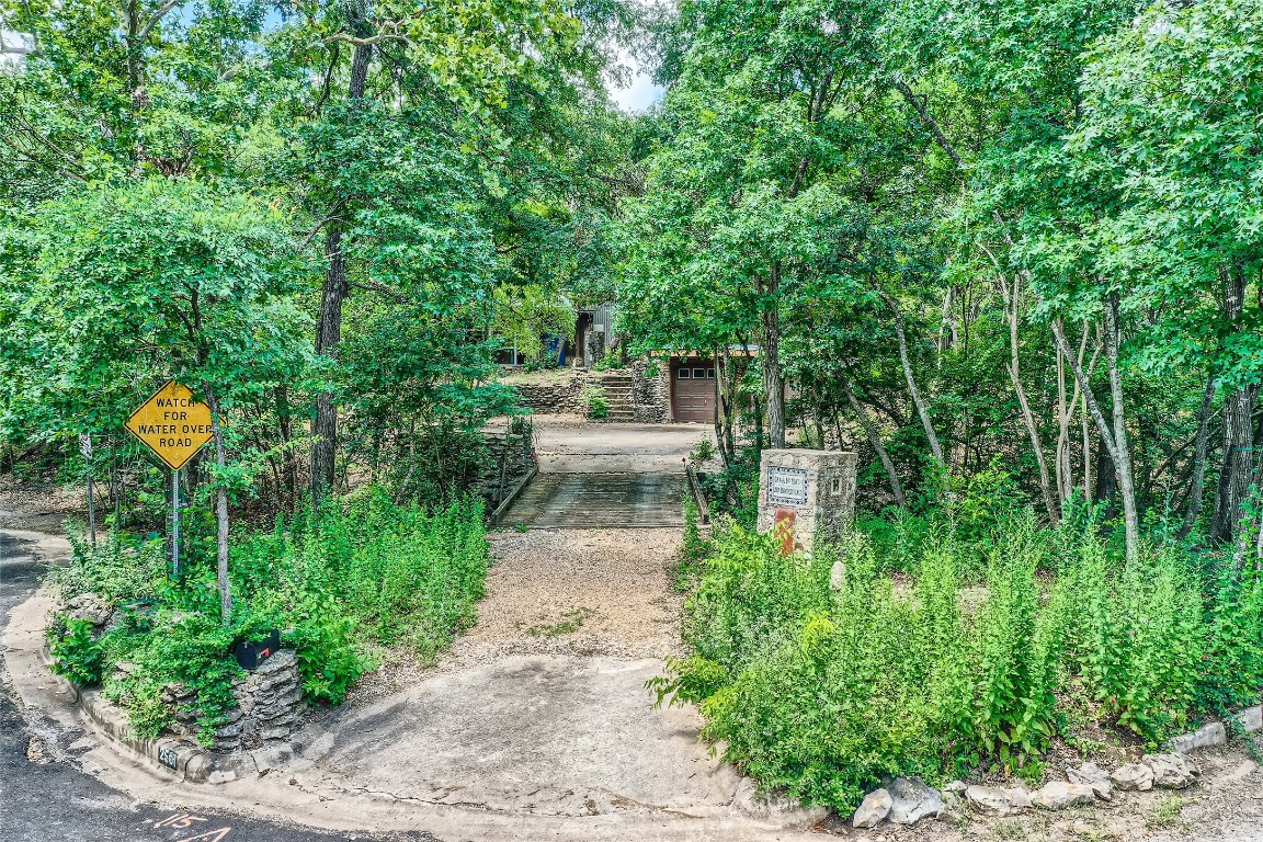 2501 Inwood Place Austin, TX 78703 - Photo 9 of 18 a view of a garden with lawn chairs and plants
