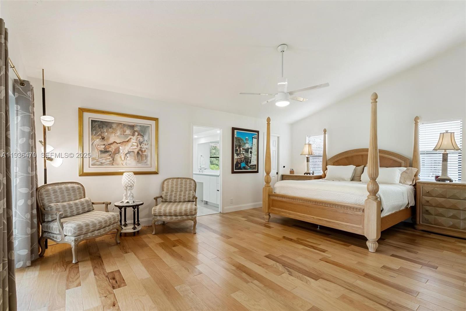 2685 Northwest 27th Terrace Boca Raton, FL 33434 - Photo 11 of 31 a bedroom with furniture and wooden floor