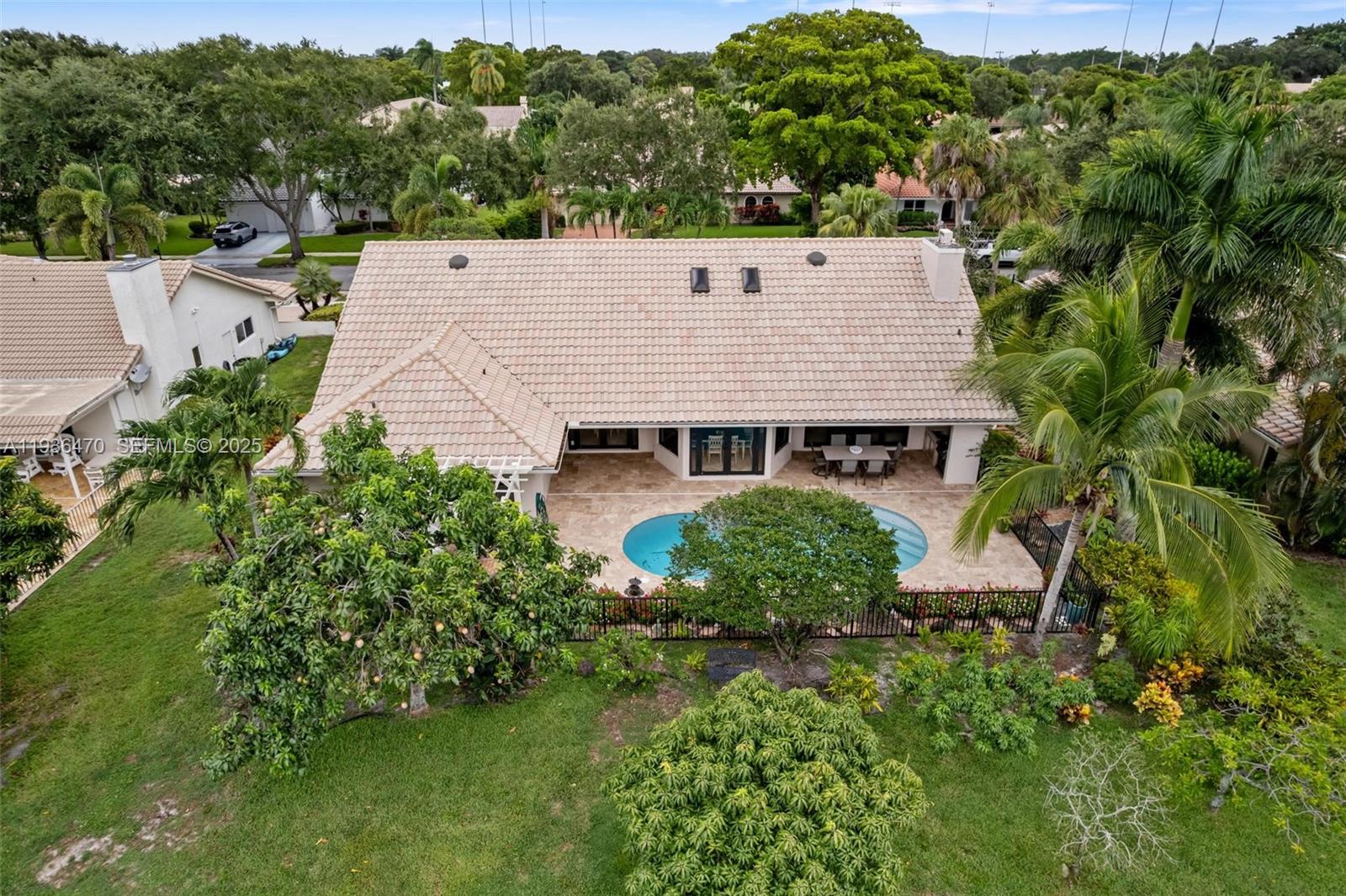 2685 Northwest 27th Terrace Boca Raton, FL 33434 - Photo 29 of 31 an aerial view of a house