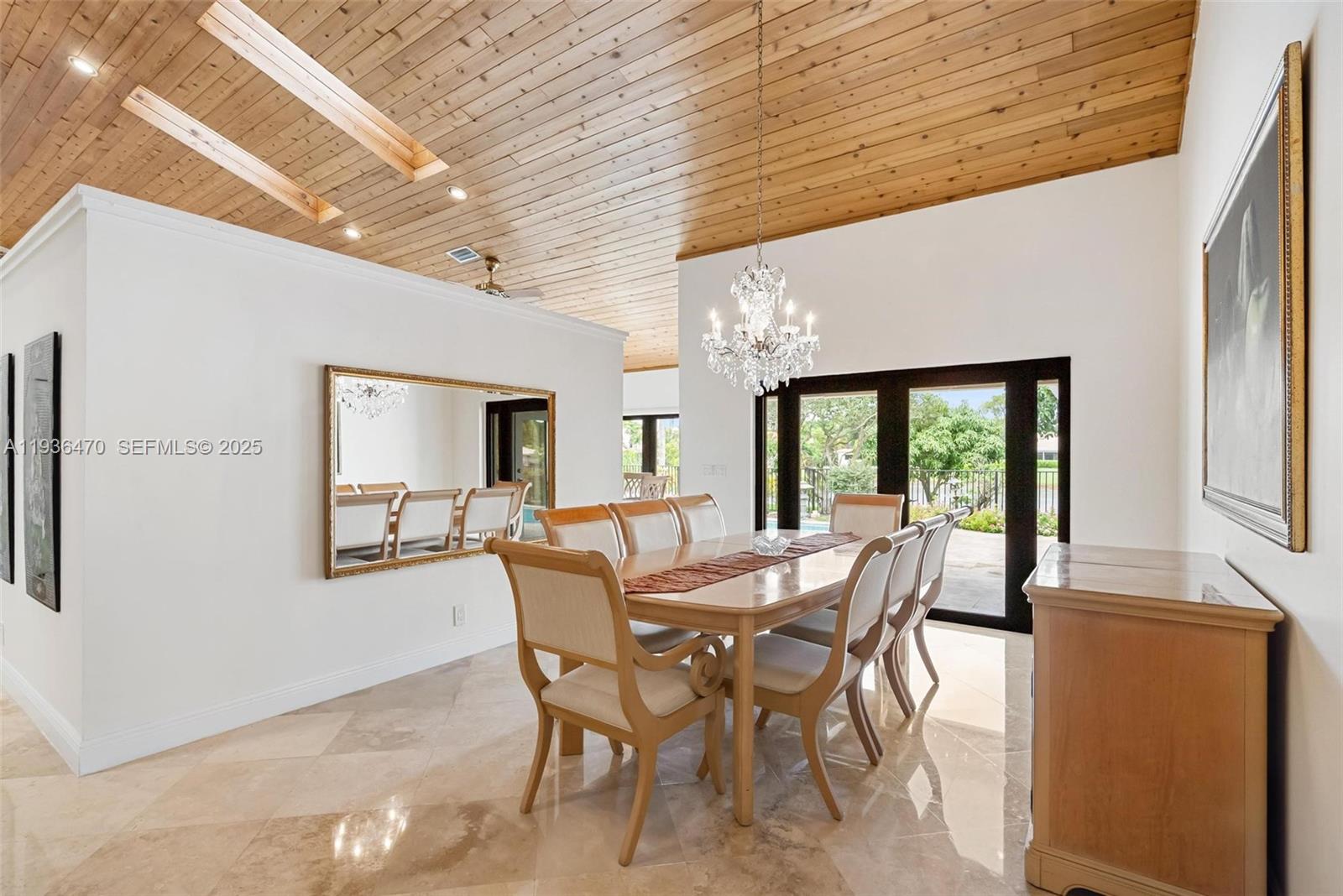 2685 Northwest 27th Terrace Boca Raton, FL 33434 - Photo 5 of 31 a view of a dining room with furniture window and outside view