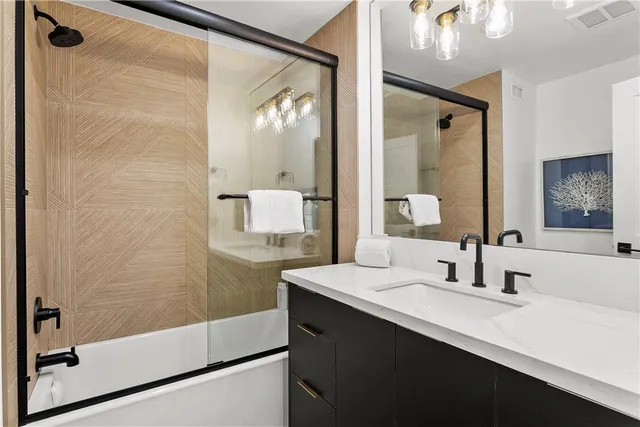 a view of a hallway with washer and dryer