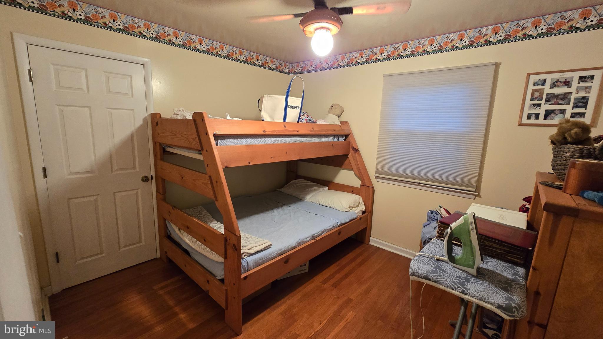 617 Meadowlark Road Norristown, PA 19403 - Photo 11 of 20 a bedroom with a bed and wooden floor
