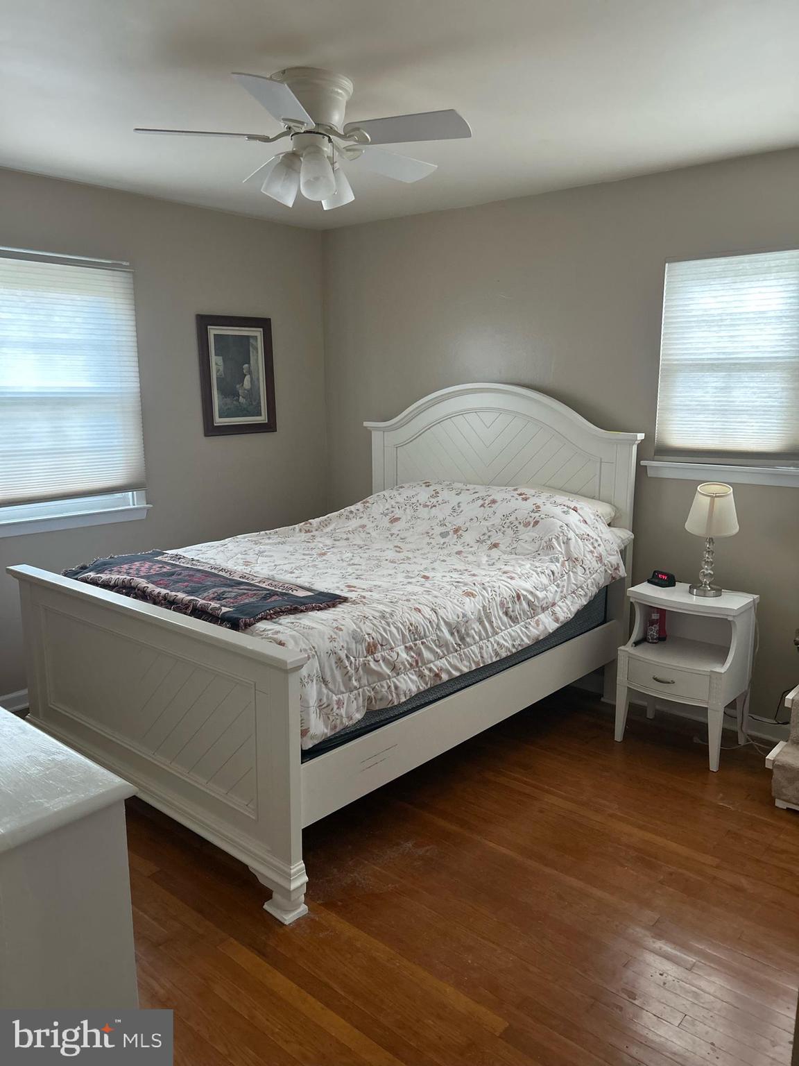 617 Meadowlark Road Norristown, PA 19403 - Photo 17 of 20 a bedroom with a bed and a chandelier