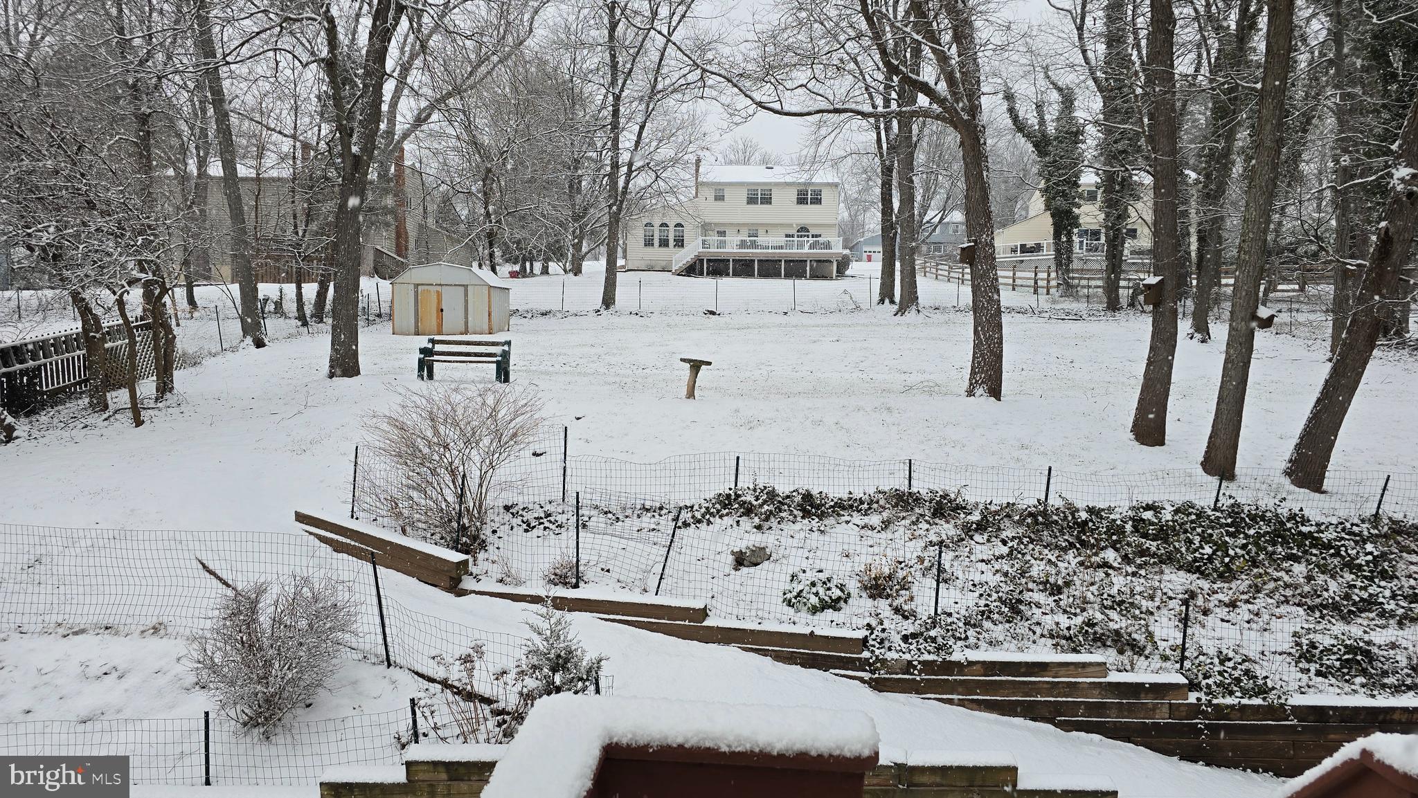 617 Meadowlark Road Audubon, PA 19403 - Photo 21 of 22 a view of a yard covered with snow