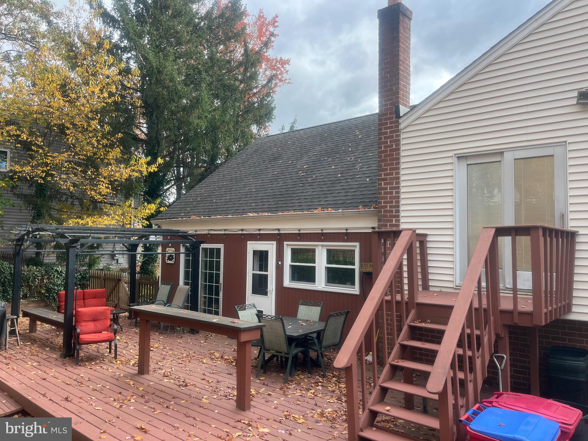 617 Meadowlark Road Norristown, PA 19403 - Photo 4 of 20 a view of deck with chairs and wooden fence