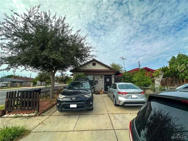 a view of a car parked in front of a building