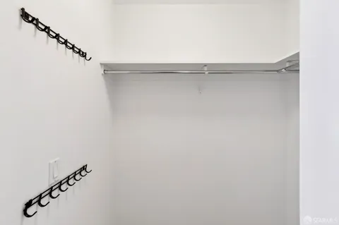 a view of small space with racks on the wall