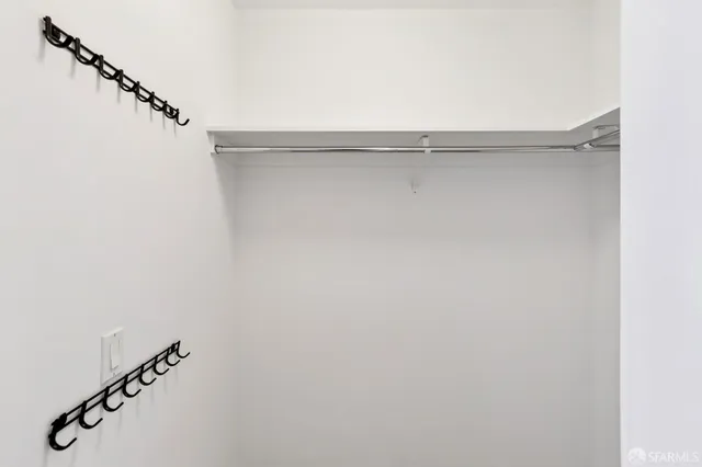 a view of small space with racks on the wall